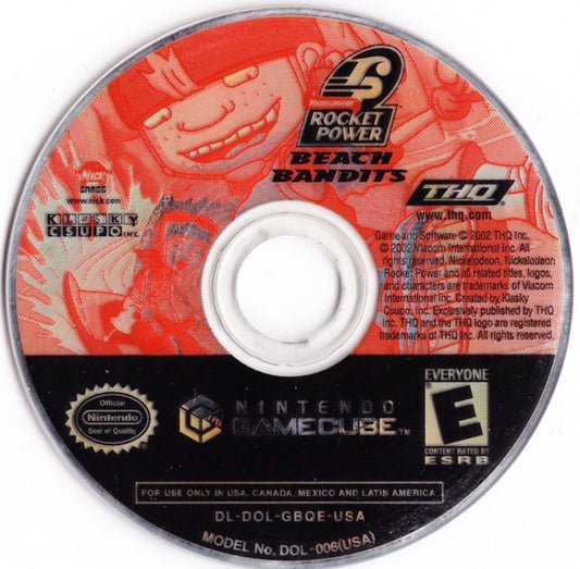 Retro Rocket Power Beach Bandits GameCube inspired design featuring animated extreme sports adventure aesthetic Nintendo GameCube coastal skate culture surfing skating biking beachside missions cartoon style characters nostalgic Nickelodeon gameplay presentation - disc