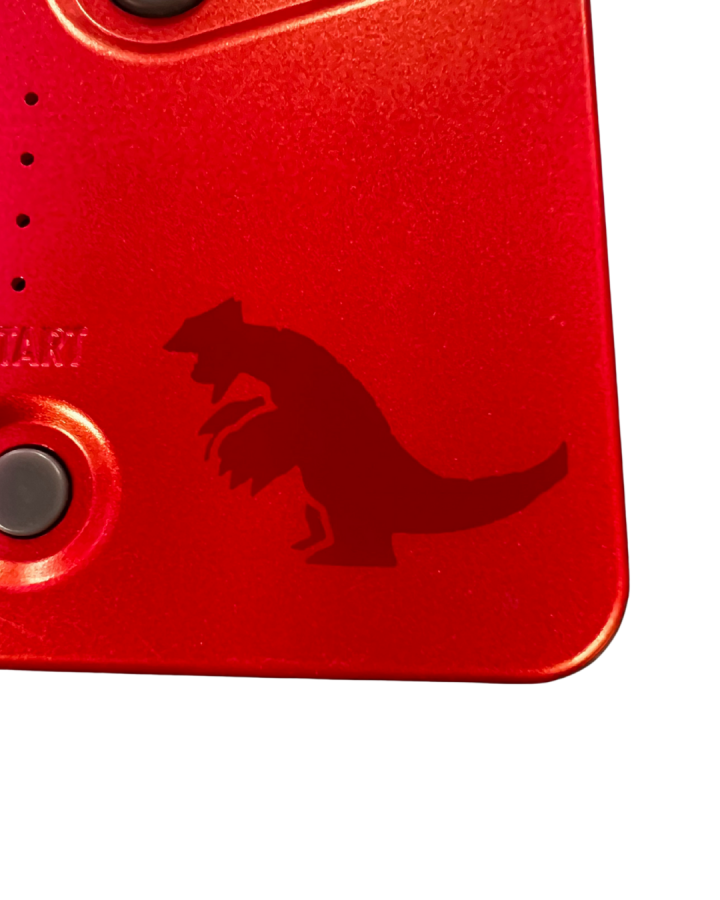 Close-up view of the official Game Boy Advance SP Groudon Edition console opened, showing the Groudon artwork printed on the inner shell beneath the screen.