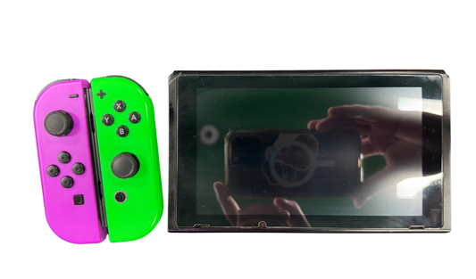 Nintendo Switch System NS with Dock Green and Purple Joy Cons Scratch and Scuff Condition Nintendo hybrid gaming console handheld and TV play modes detachable Joy Con controllers touchscreen display multiplayer gaming dock included colorful controller design used Nintendo gaming system console hardware collectible gaming setup appeal
console ad controller