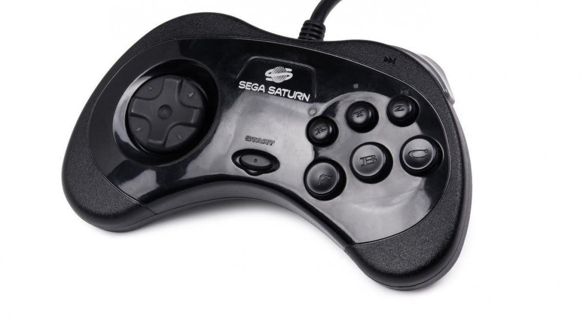 Sega Saturn console featuring classic 90s design and retro CD-based gaming system view of the controller
