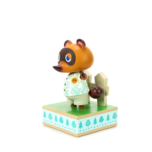 Tom Nook 9 inch statue by First 4 Figures detailed Animal Crossing collectible featuring iconic raccoon entrepreneur character design and premium display quality celebrating the Nintendo life simulation franchise side view