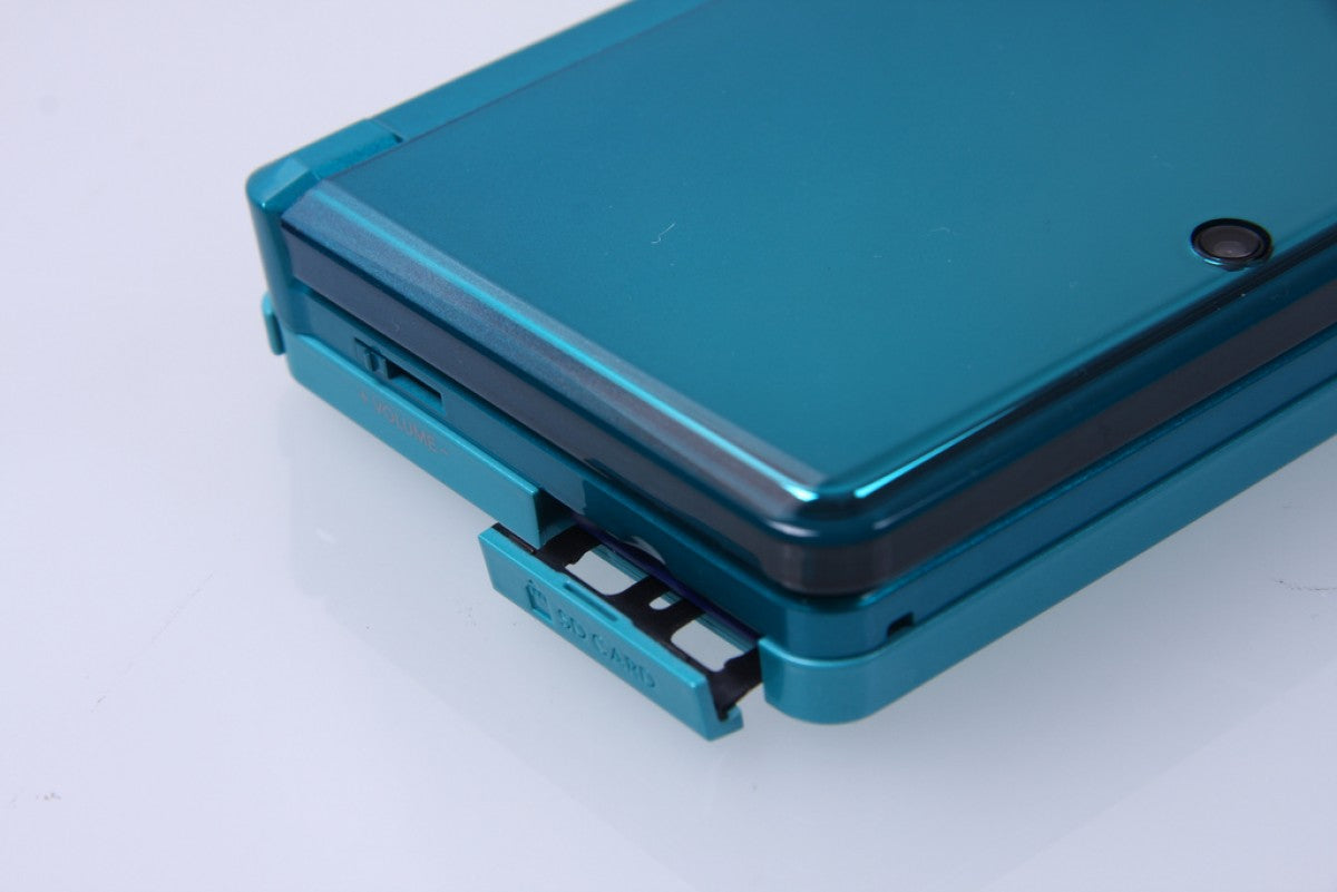 Nintendo 3DS system SD card slot in aqua blue featuring glasses-free 3D gaming and dual-screen handheld design