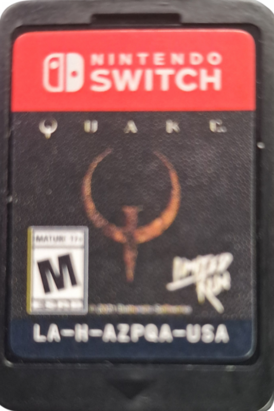 Quake II Nintendo Switch inspired design featuring sci fi first person shooter aesthetic futuristic military combat hostile alien Strogg forces fast paced action intense weapons based gameplay classic arena shooter revival modern enhanced presentation cartridge