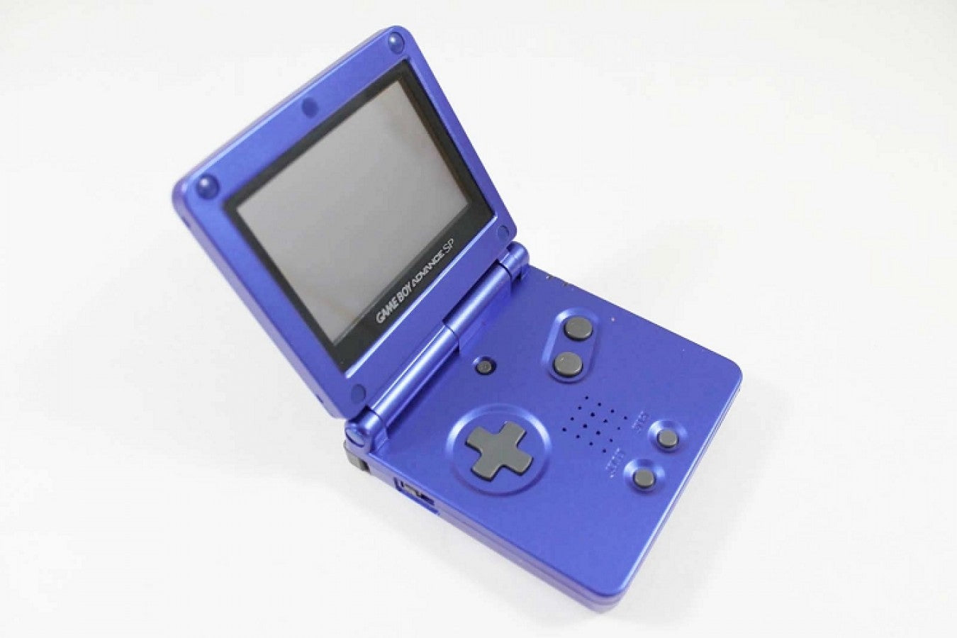 Cobalt Blue Game Boy Advance SP handheld console featuring compact flip design and retro gaming style open and displaying buttons and screen
