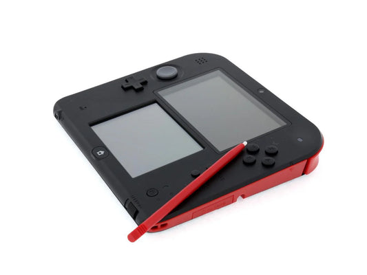 Top side view of a black and red Nintendo 2DS handheld console showing the game cartridge slot, stylus holder, and shoulder buttons.