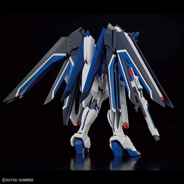 STTS-909 Rising Freedom Gundam Gundam SEED Freedom Bandai Hobby HGCE 1/144 scale model kit inspired design featuring detailed mecha construction aesthetic advanced mobile suit design articulated armor components futuristic weapon systems dynamic flight capabilities collectible plastic model building and anime inspired display presentation