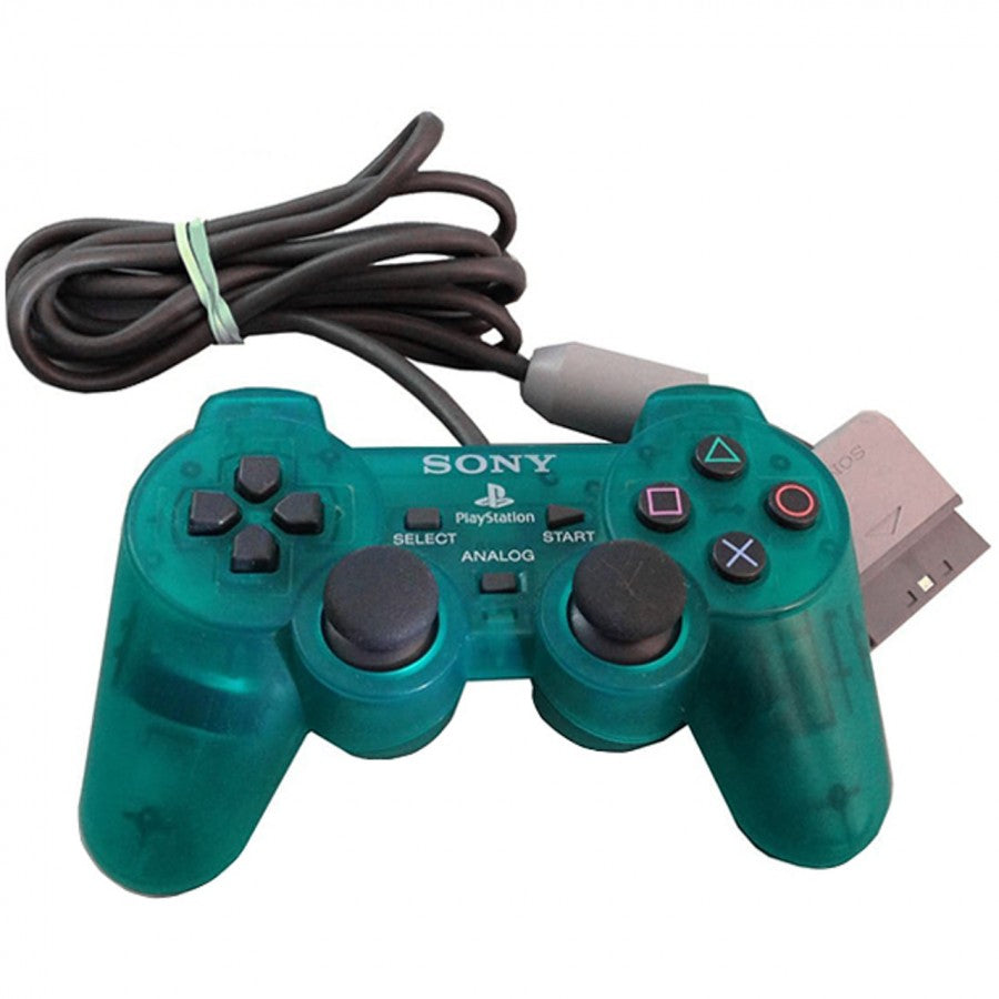 Emerald green PS1 DualShock controller with translucent casing and classic PlayStation buttons and analog sticks