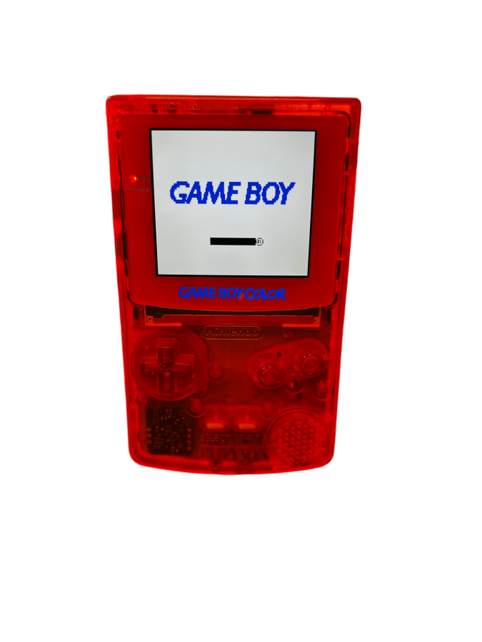 Front view of a clear orange custom Nintendo Game Boy Color handheld console turned on with the screen illuminated and buttons visible.