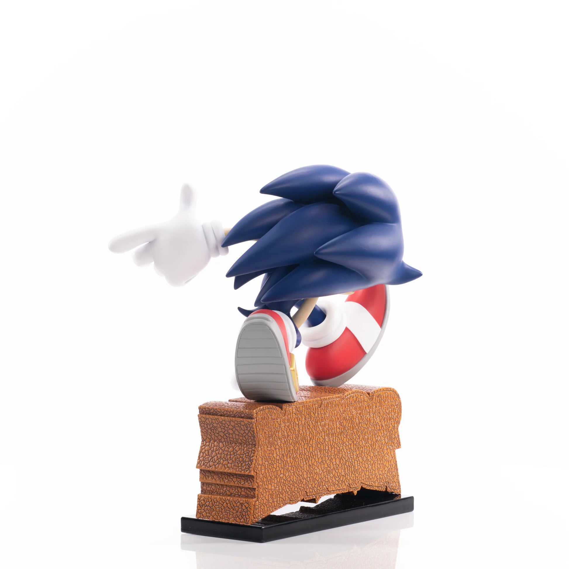 Sonic the Hedgehog First 4 Figures 9 inch statue featuring a dynamic running pose with detailed sculpt vibrant blue coloring themed display base inspired by the Sonic Adventure series and high quality collectible design for display
