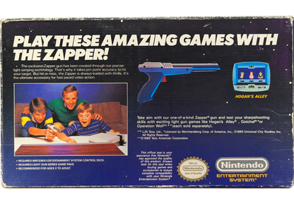 Nintendo Zapper OEM [Gray][In Box Missing Manuals/Inserts] for Nintendo Entertainment System (NES) accessory featuring the classic light gun controller used for Duck Hunt and other shooting games; includes the original box but is missing the manuals and inserts with an authentic gray OEM zapper inside back of real box