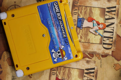 Game Boy Advance SP Custom One Piece Shell Nintendo handheld console with custom One Piece themed shell clamshell design backlit screen rechargeable battery cartridge based portable retro gaming system back