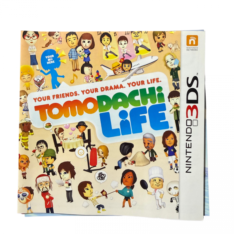 Manual for Tomodachi Life Complete in Box for Nintendo 3DS, a life simulation and social simulation game featuring Mii characters, with original game case, cartridge, and inserts.