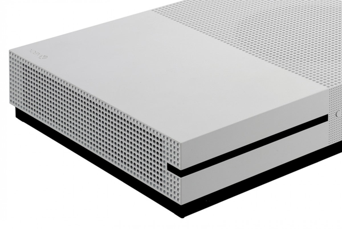 Front corner of an Xbox One S console showing power button and disc slot