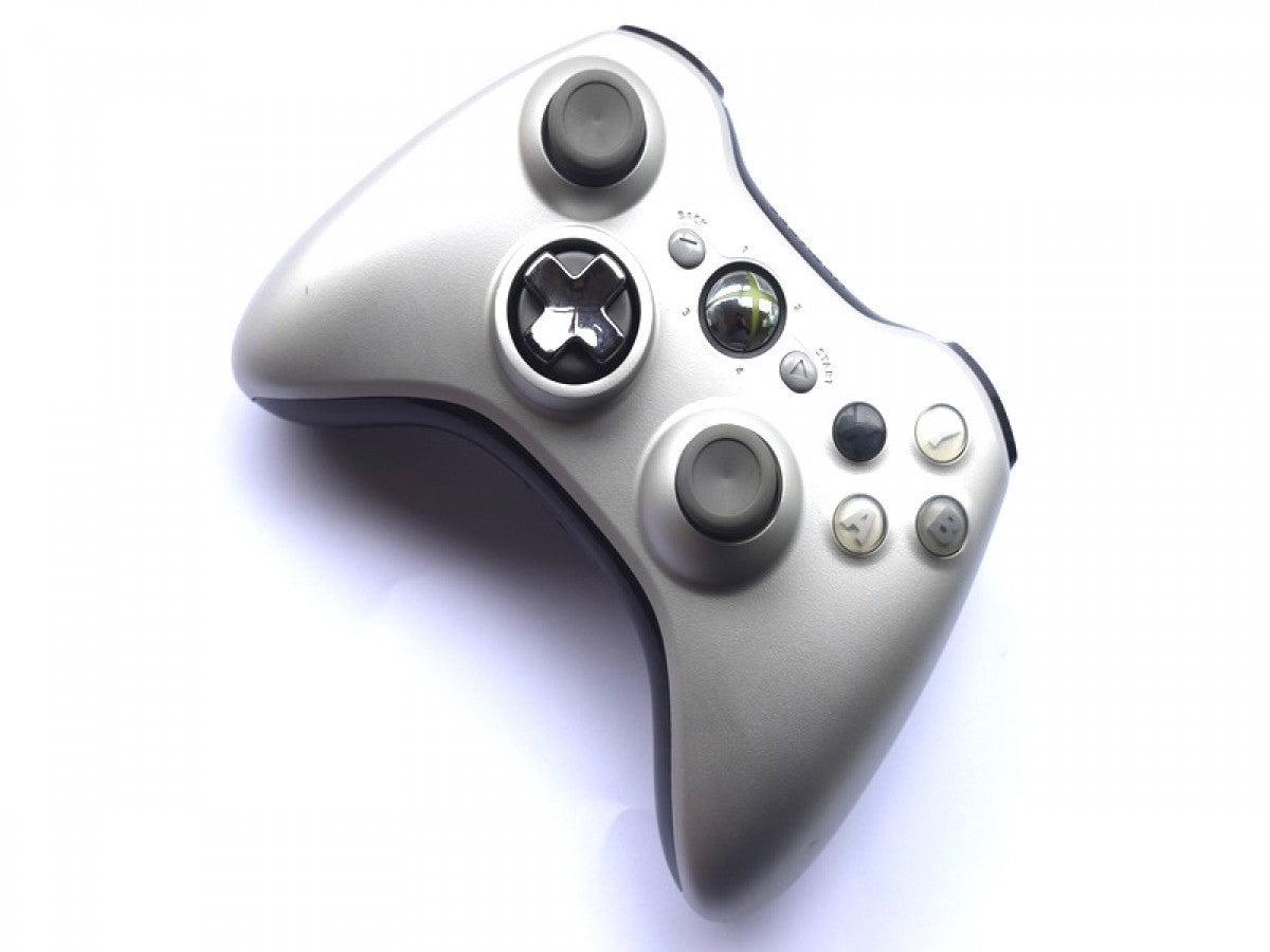 Silver Xbox 360 controller with ergonomic design and classic Xbox button layout