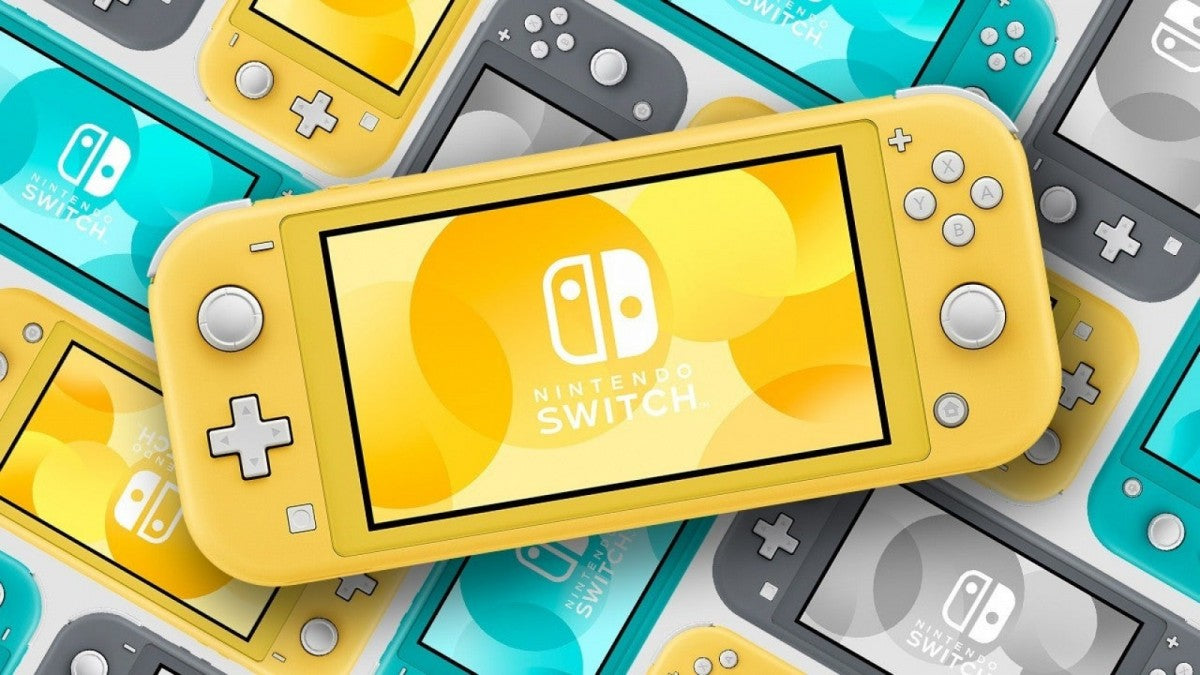 Yellow Nintendo Switch Lite console placed on top of its retail box, stacked alongside gray and blue Switch Lite boxes in the background.