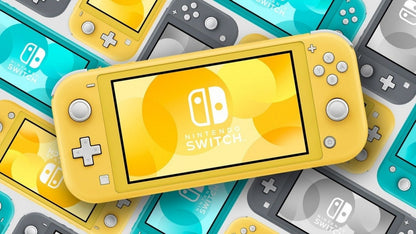 Yellow Nintendo Switch Lite console placed on top of its retail box, stacked alongside gray and blue Switch Lite boxes in the background.