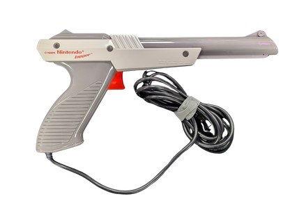 Nintendo Zapper OEM [Gray][In Box Missing Manuals/Inserts] for Nintendo Entertainment System (NES) accessory featuring the classic light gun controller used for Duck Hunt and other shooting games; includes the original box but is missing the manuals and inserts with an authentic gray OEM zapper inside real accesory with cord