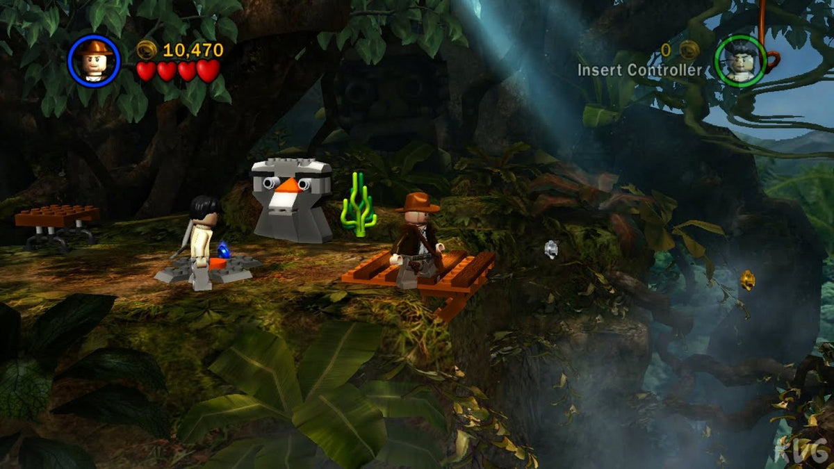 LEGO Indiana Jones The Original Adventures Platinum Family Hits Xbox 360 video game featuring action adventure gameplay based on Indiana Jones classic movie scenes LEGO characters exploration puzzle solving combat challenges collectible treasures and cooperative gameplay Xbox 360 retro video game collection collectible gaming appeal gameplay