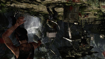 Tomb Raider Game of the Year Edition Xbox 360 action-adventure reboot origin story Lara Croft survival island Yamatai exploration puzzle-solving combat bow and arrows climbing tombs scavenging animal hunting character progression RPG elements upgrade system story-driven third-person perspective hub areas all downloadable content included complete experience gameplay screenshot