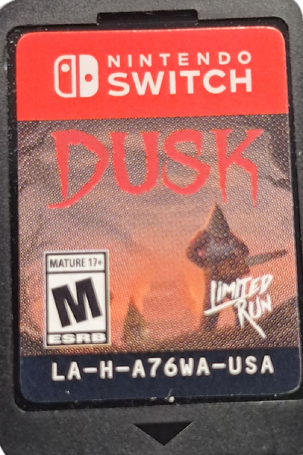 DUSK Nintendo Switch inspired design featuring retro inspired first person shooter aesthetic fast paced combat gothic horror environments relentless enemy encounters classic arena action old school gameplay intensity and atmospheric adventure presentation cartridge