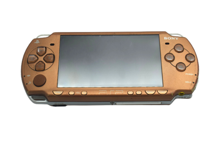 Bronze PlayStation Portable 2000 PSP 2000 handheld gaming console featuring metallic bronze finish portable Sony gaming UMD game support Memory Stick storage widescreen LCD display built-in controls rechargeable battery classic PSP hardware and collectible gaming appeal front of console 