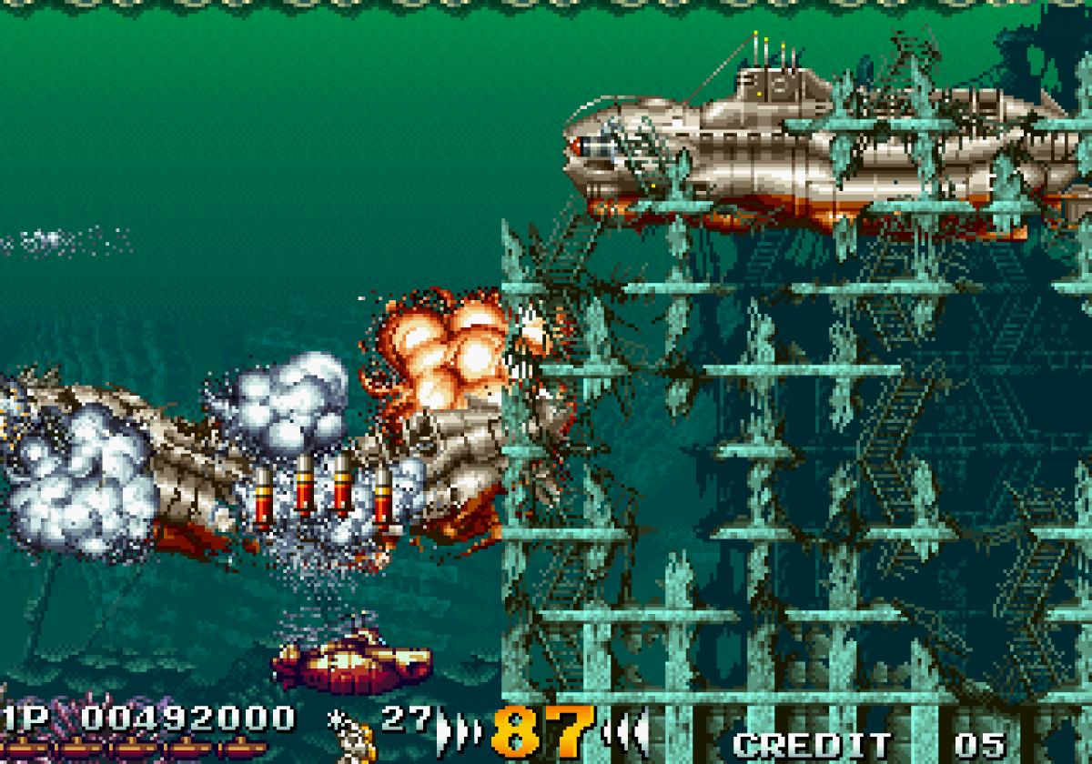 In The Hunt arcade Sega Saturn side scrolling submarine shooter underwater combat military sci fi action giant mechanical enemies explosive torpedoes Irem arcade port retro gaming Sega Saturn software video game title gameplay 