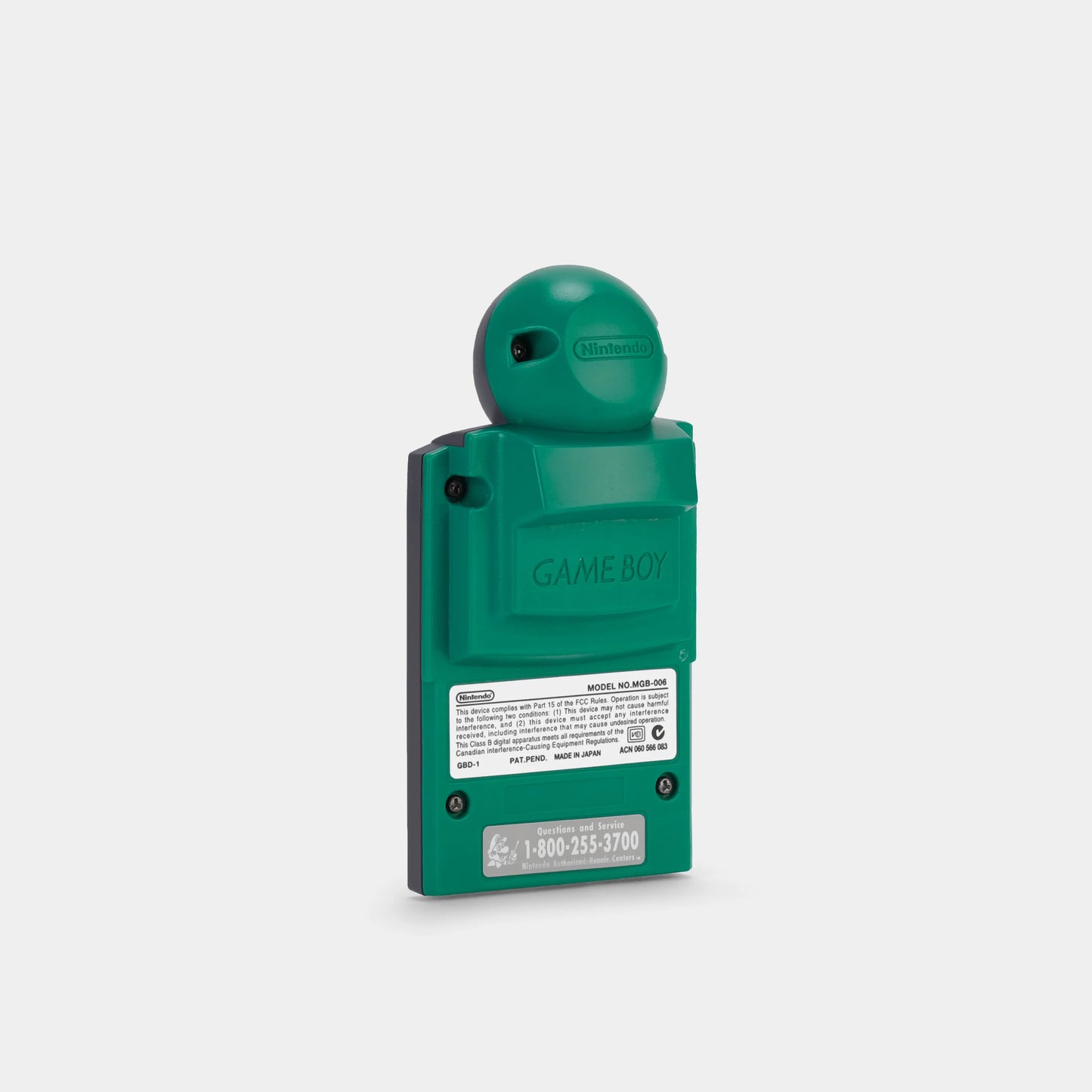 Green Game Boy Camera original Nintendo accessory for Game Boy featuring classic monochrome photography gameplay collectible retro handheld camera cartridge compatible with Game Boy systems back view of labels