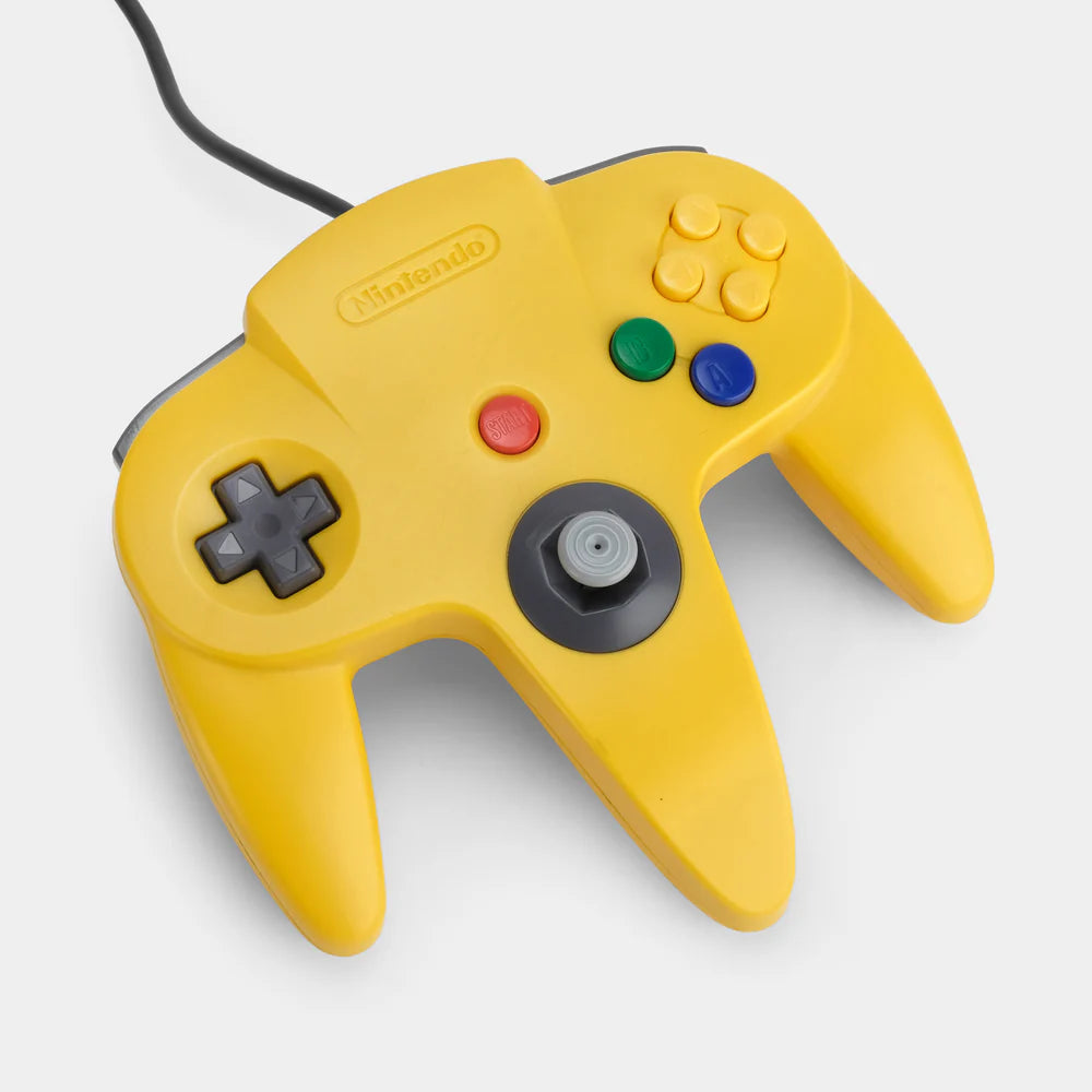 Nintendo 64 Controller Yellow OEM original first party controller for the Nintendo 64 featuring a bright yellow design with analog stick ergonomic three prong grip and responsive buttons for classic multiplayer gaming front