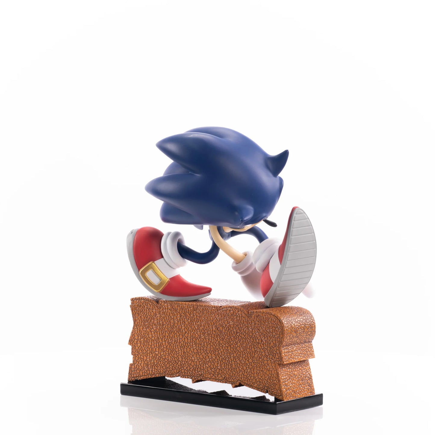 Sonic the Hedgehog First 4 Figures 9 inch statue featuring a dynamic running pose with detailed sculpt vibrant blue coloring themed display base inspired by the Sonic Adventure series and high quality collectible design for display
