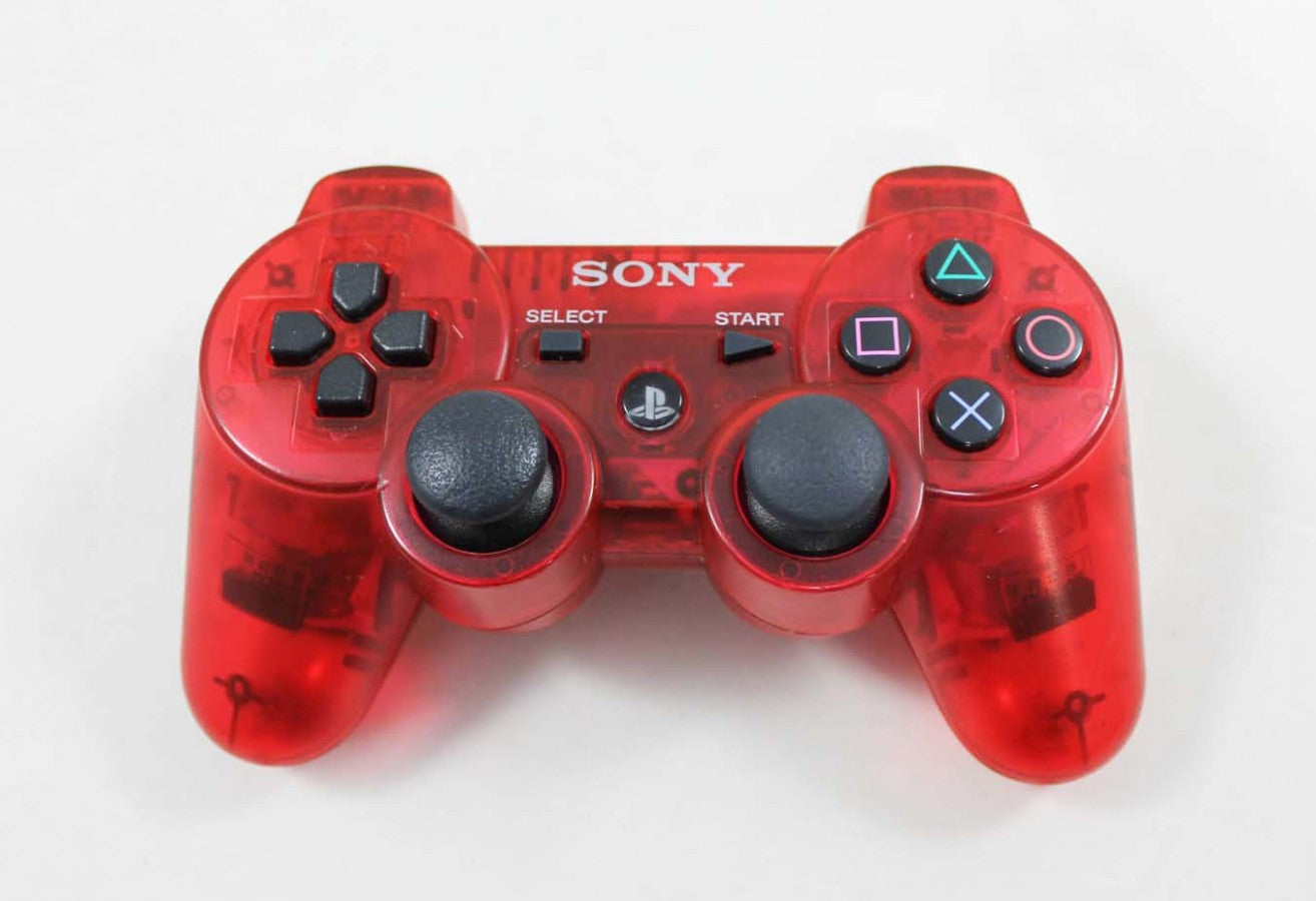 DualShock 3 Crystal Clear Red PlayStation 3 controller featuring translucent red shell wireless Bluetooth connectivity built in rechargeable battery motion sensing Sixaxis support and classic Sony PS3 gamepad design front