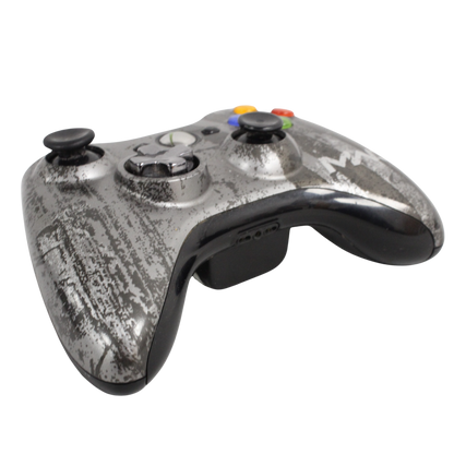 Xbox 360 Wireless Controller Call of Duty: Modern Warfare 3 Edition for Xbox 360 (X360) at Gamers INC, featuring the limited edition military-inspired design with custom "weathered" artwork and a transforming D-pad that rotates from a plus to a disc for ultimate control, providing the precision needed to dominate the battlefield in a rugged, collectible peripheral built for the most dedicated Call of Duty fans left side