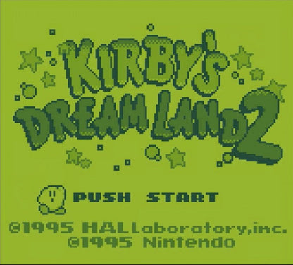 Kirby's Dream Land 2 [CIB] for Game Boy (GB) featuring a charming side scrolling platform adventure where Kirby teams up with animal friends to gain new abilities; explore colorful stages defeat King Dedede and save Dream Land in this complete in box handheld classic main menu title screen