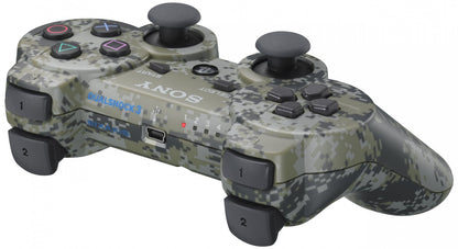 PS3 DualShock Controller – Digital Camo wireless gaming controller featuring:

DualShock vibration feedback for immersive force feedback during gameplay

Iconic Digital Camo camo-style design

Pressure sensitive buttons & dual analog sticks for precise control

Built-in Sixaxis motion sensing support

Compatible with PlayStation 3 games

A great accessory to enhance your PS3 gaming experience with reliable ergonomics and responsive controls.