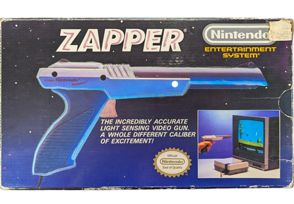 Nintendo Zapper OEM [Gray][In Box Missing Manuals/Inserts] for Nintendo Entertainment System (NES) accessory featuring the classic light gun controller used for Duck Hunt and other shooting games; includes the original box but is missing the manuals and inserts with an authentic gray OEM zapper inside real front box