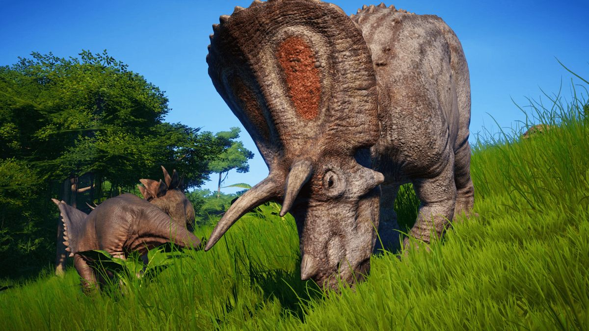 Jurassic World Evolution PlayStation 4 PS4 park management simulation video game building dinosaur theme park on five islands researching DNA creating dinosaurs from films containing herbivores carnivores enclosures guest facilities Sabertooth games gameplay
