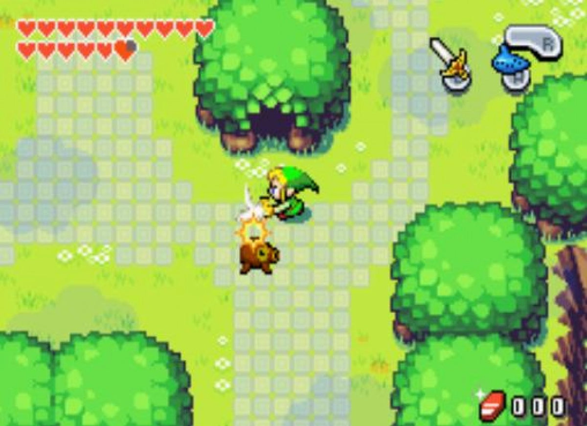 The Legend of Zelda The Minish Cap Game Boy Advance gameplay for retro video game featuring action adventure gameplay, top down exploration, magical shrinking mechanic, puzzle solving dungeons, fantasy world Hyrule quests, and classic portable Zelda adventure on GBA system