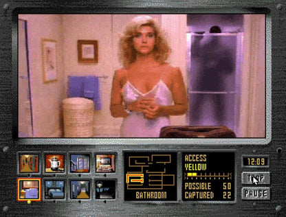 Night Trap Sega CD 32X (enhanced Sega CD version) full motion video FMV interactive movie game surveillance horror traps gameplay live action footage mansion setting vampire attack storyline branching choices Digital Pictures retro gaming Sega CD software video game title gameplay
