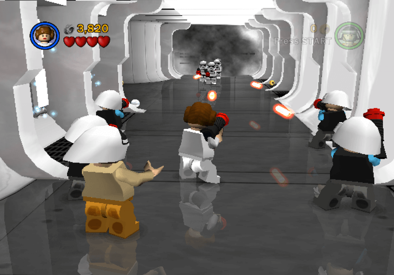 Lego Star Wars II: The Original Trilogy Player’s Choice for GameCube featuring classic Star Wars characters in family-friendly action gameplay blaster fight