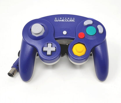 Indigo Clear Nintendo GameCube controller featuring translucent indigo shell wired connection analog control stick C stick dual shoulder triggers vibration feedback and classic ergonomic design for GameCube gameplay angled front