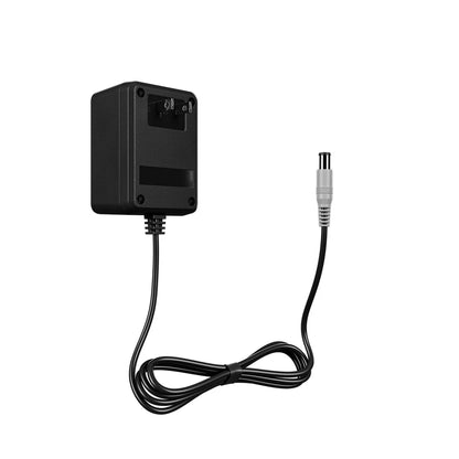 Super Nintendo SNES AC power adapter close up with cable and plug for retro gaming console