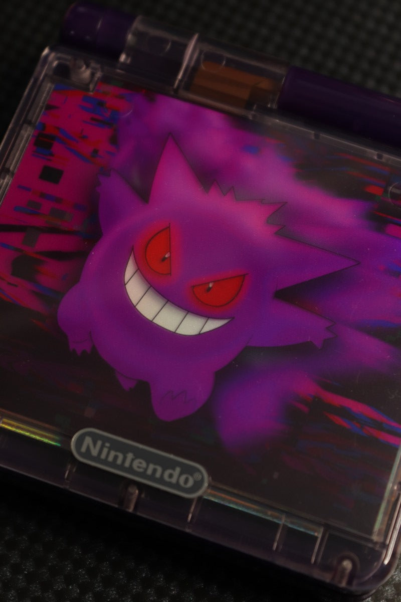 Game Boy Advance SP Custom Gengar Shell Nintendo handheld console with custom Gengar themed shell clamshell design backlit screen rechargeable battery cartridge based portable retro gaming system