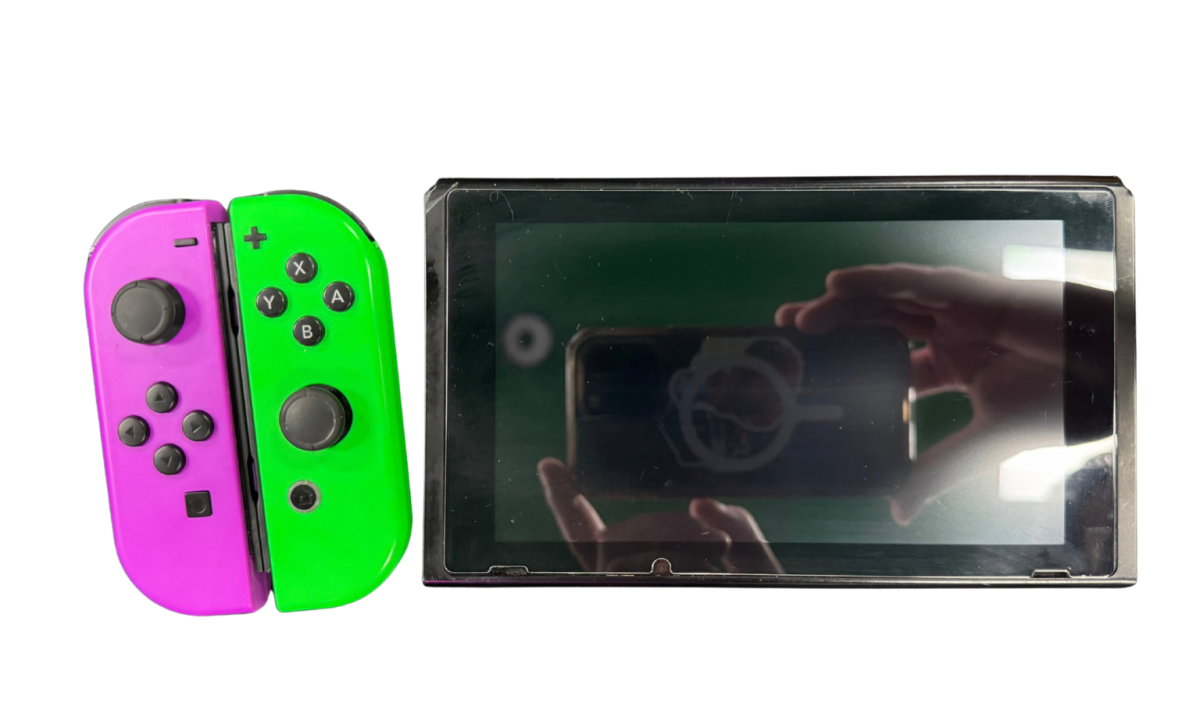Nintendo Switch System NS with Dock Green and Purple Joy Cons Scratch and Scuff Condition Nintendo hybrid gaming console handheld and TV play modes detachable Joy Con controllers touchscreen display multiplayer gaming dock included colorful controller design used Nintendo gaming system console hardware collectible gaming setup appeal
console ad controller
