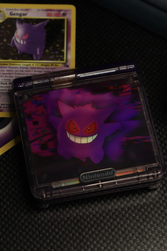 Game Boy Advance SP Custom Gengar Shell Nintendo handheld console with custom Gengar themed shell clamshell design backlit screen rechargeable battery cartridge based portable retro gaming system 