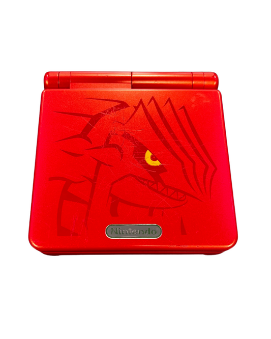 Front cover of the official Game Boy Advance SP Groudon Edition console featuring a deep red metallic finish with Groudon silhouette artwork.