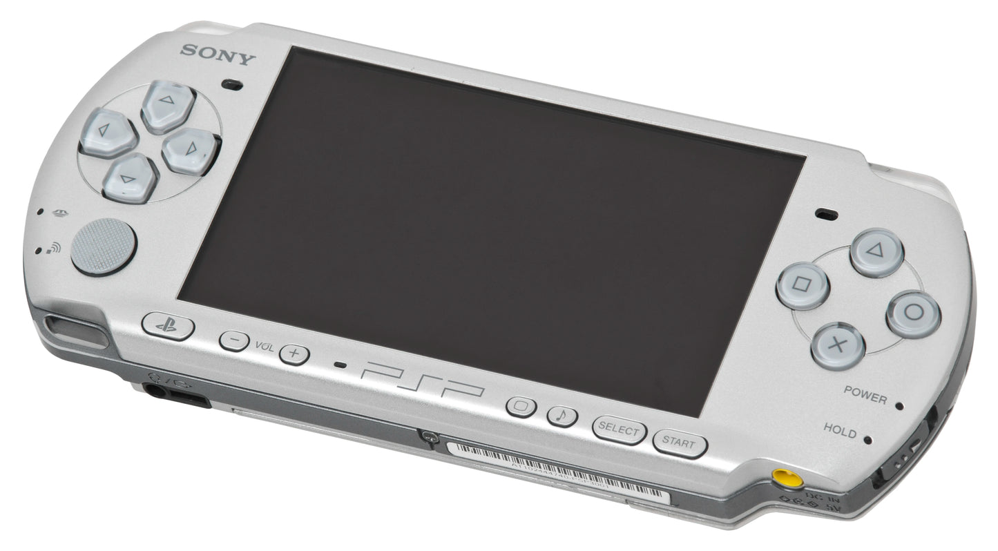 PlayStation Portable PSP 3000 Silver handheld console for video game enthusiasts featuring portable gaming hardware vibrant widescreen display built in stereo speakers ergonomic handheld design UMD game compatibility multimedia entertainment and collectible gaming appeal top angle 