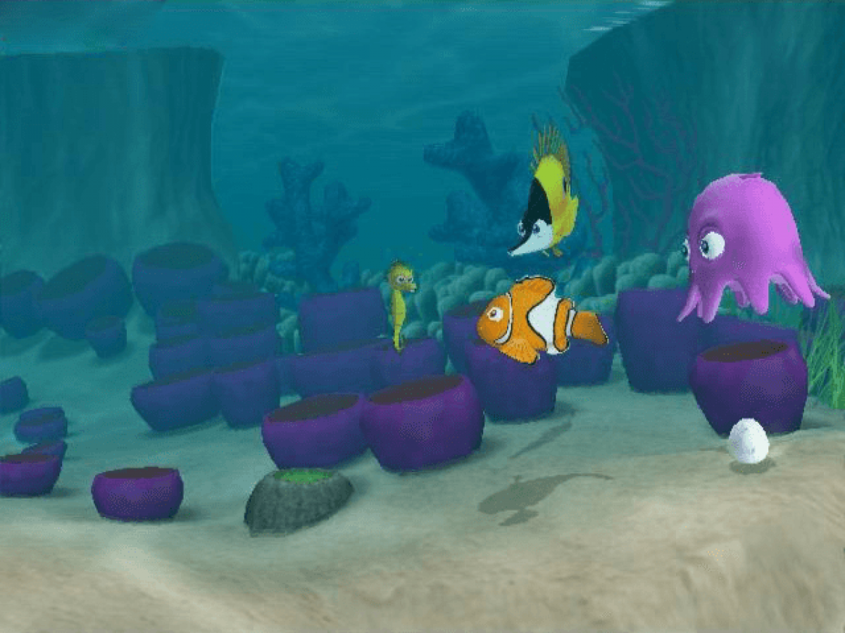 Underwater scene with animated characters including a clownfish and an octopus. Find Nemo Gameplay for Xbox Original