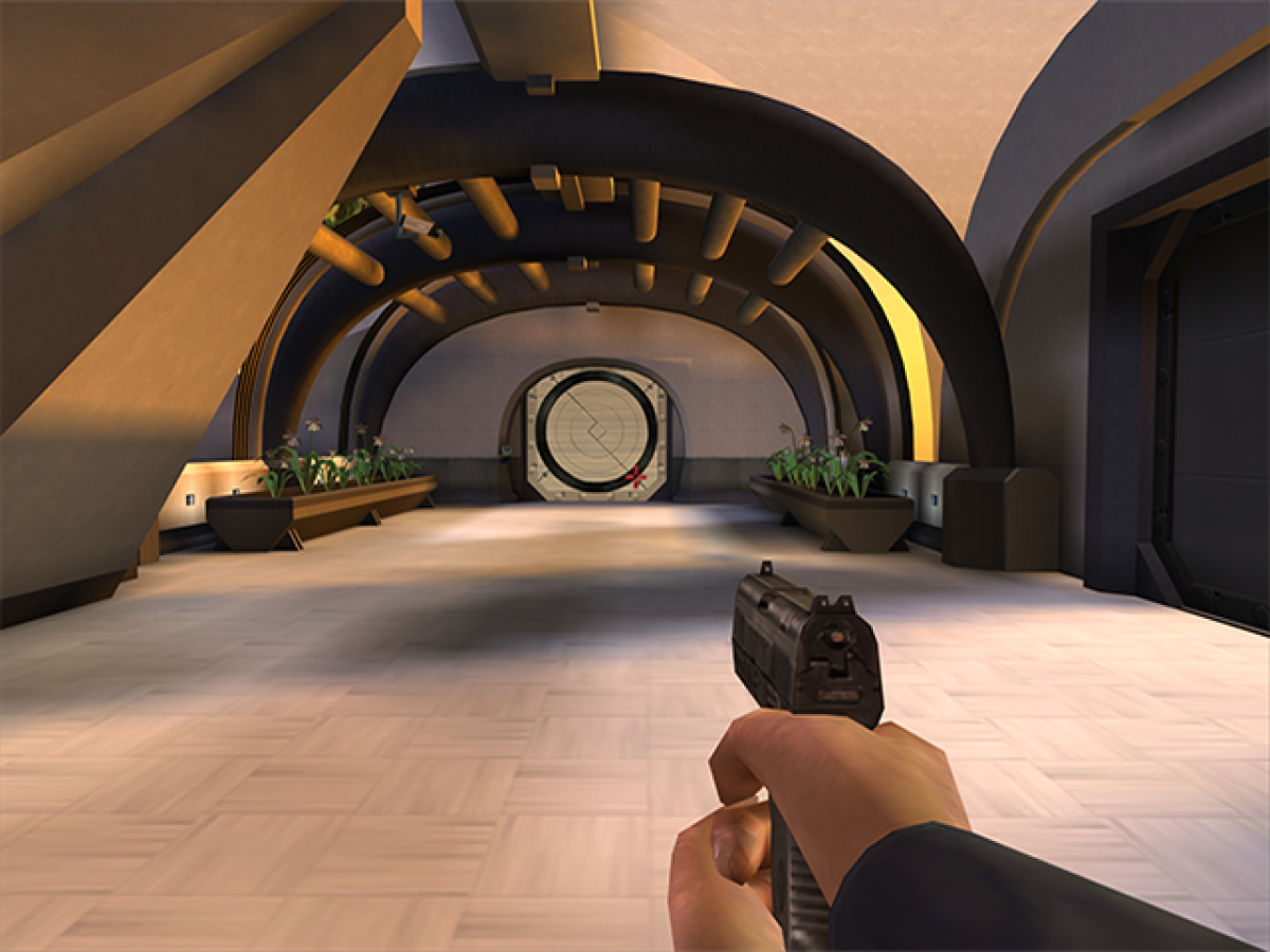 007 Agent Under Fire Player’s Choice edition game for the Nintendo GameCube featuring first person shooter gameplay with mission based objectives stealth segments driving levels and gadgets as James Bond in an original storyline gameplay 