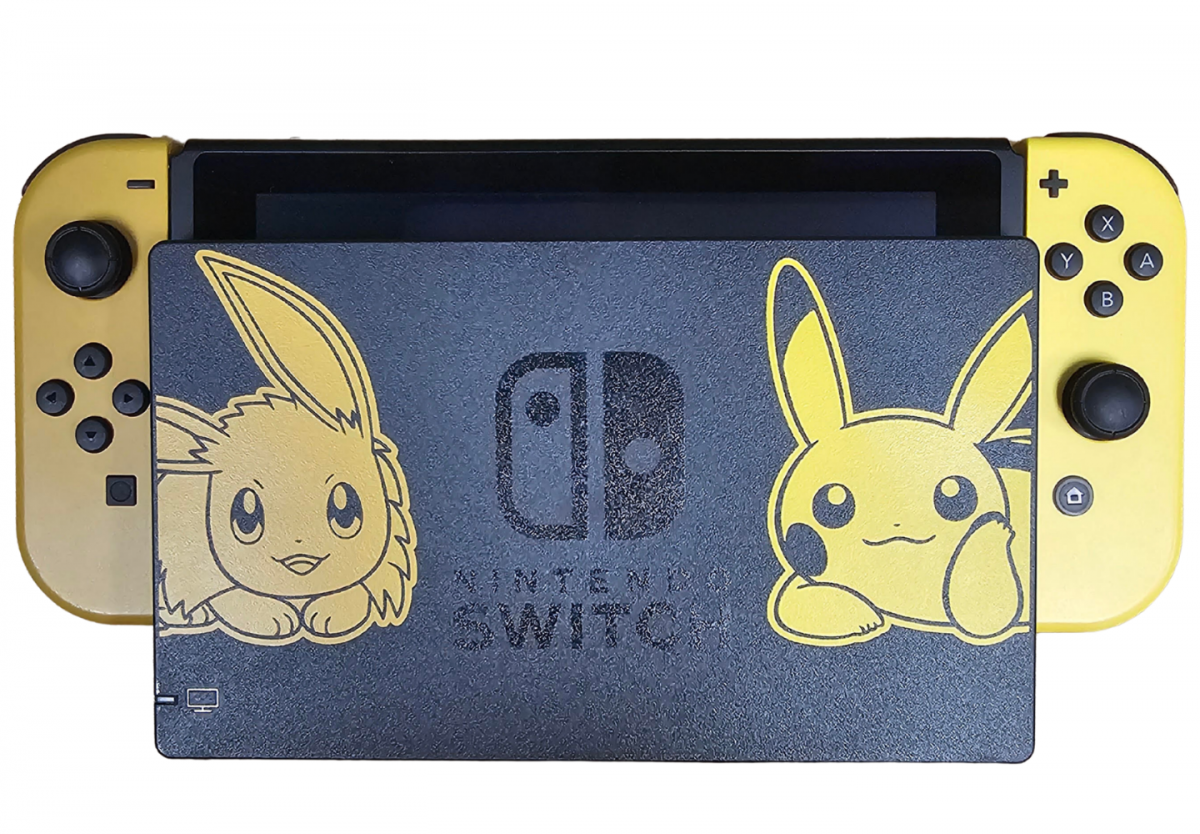 Pokémon Let's Go Pikachu Edition Nintendo Switch NS video game featuring Pokémon adventure gameplay Pikachu companion Kanto region exploration Pokémon catching turn based battles trainer challenges colorful environments and classic Nintendo Switch gameplay Pokémon collection collectible gaming appeal console in dock