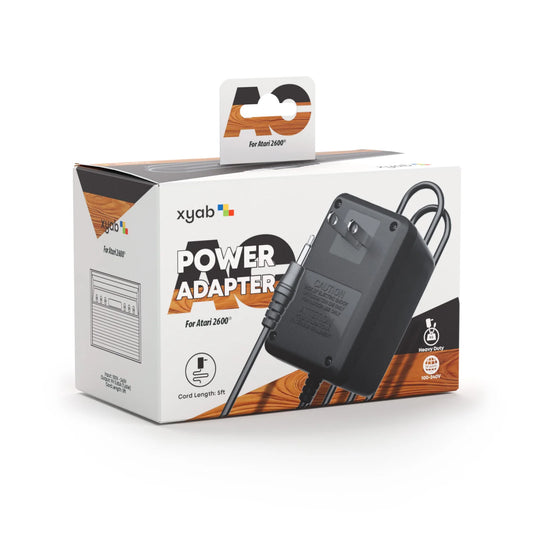 Atari 2600 power adapter retail packaging box showing replacement wall charger accessory