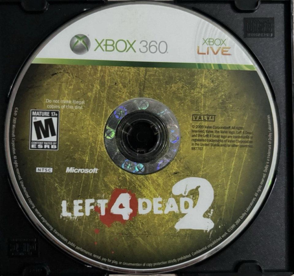 Left 4 Dead 2 disc for Xbox 360 (X360) cooperative zombie survival first-person shooter video game